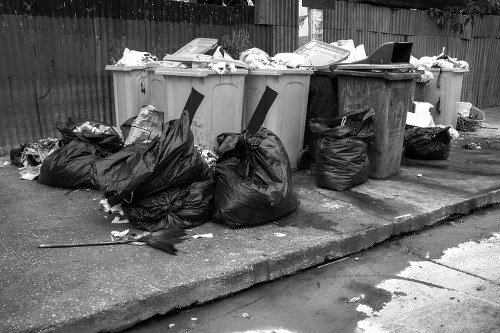 Rubbish clearance team working in a London residential street