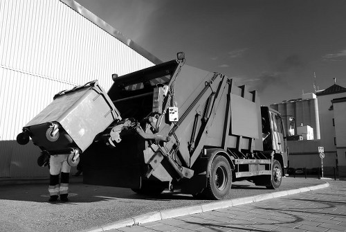 Team preparing safe rubbish collection with protective equipment