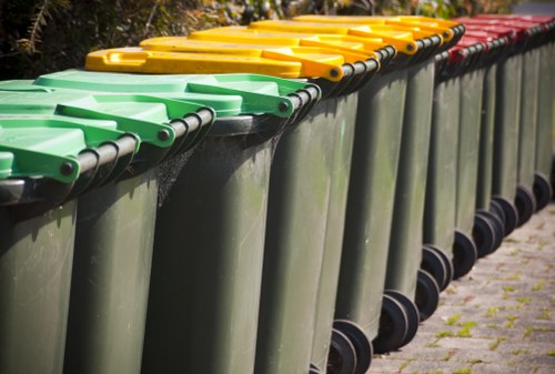 Trash collection service in London outside a residential property