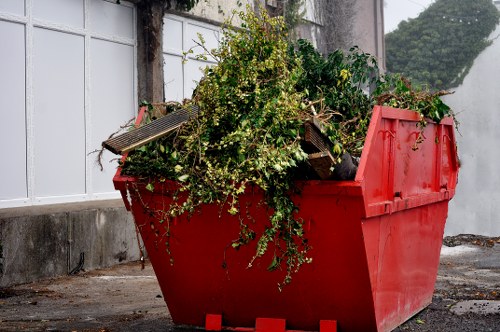 Careful sorting of belongings during an estate clearance in London